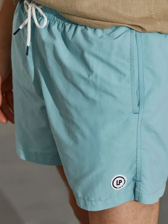 Man's regular fit swim shorts with elastic waistband and drawstring